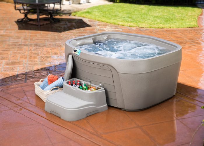 This is a lifestyle commercial photograph taken on location by Skip O'Donnell off ODonnell photograf of a Fantasy Drift hot tub for Watkins Spa in Rancho Santa Fe, San Diego, California